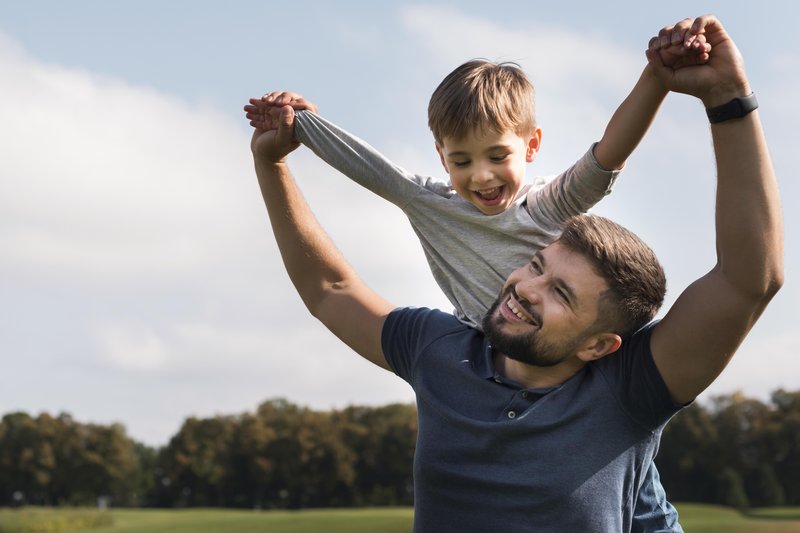 father-son-having-good-time-park